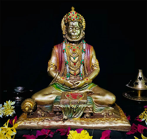 Sitting Hanuman ji image with black background for 108 names of hanuman ji 